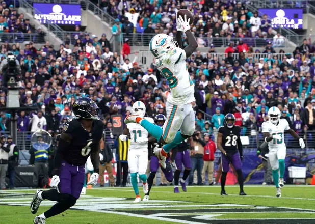Ravens Secure AFC's Top Seed with Dominant Victory Over Dolphins